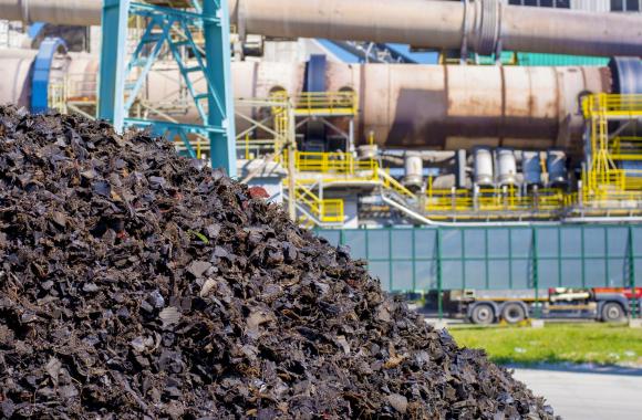 Materials pile at cement manufacturing facility