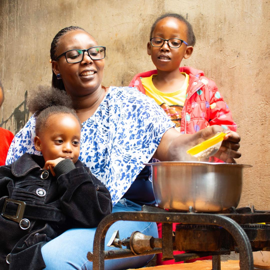 Family cooking on a clean stove indoors